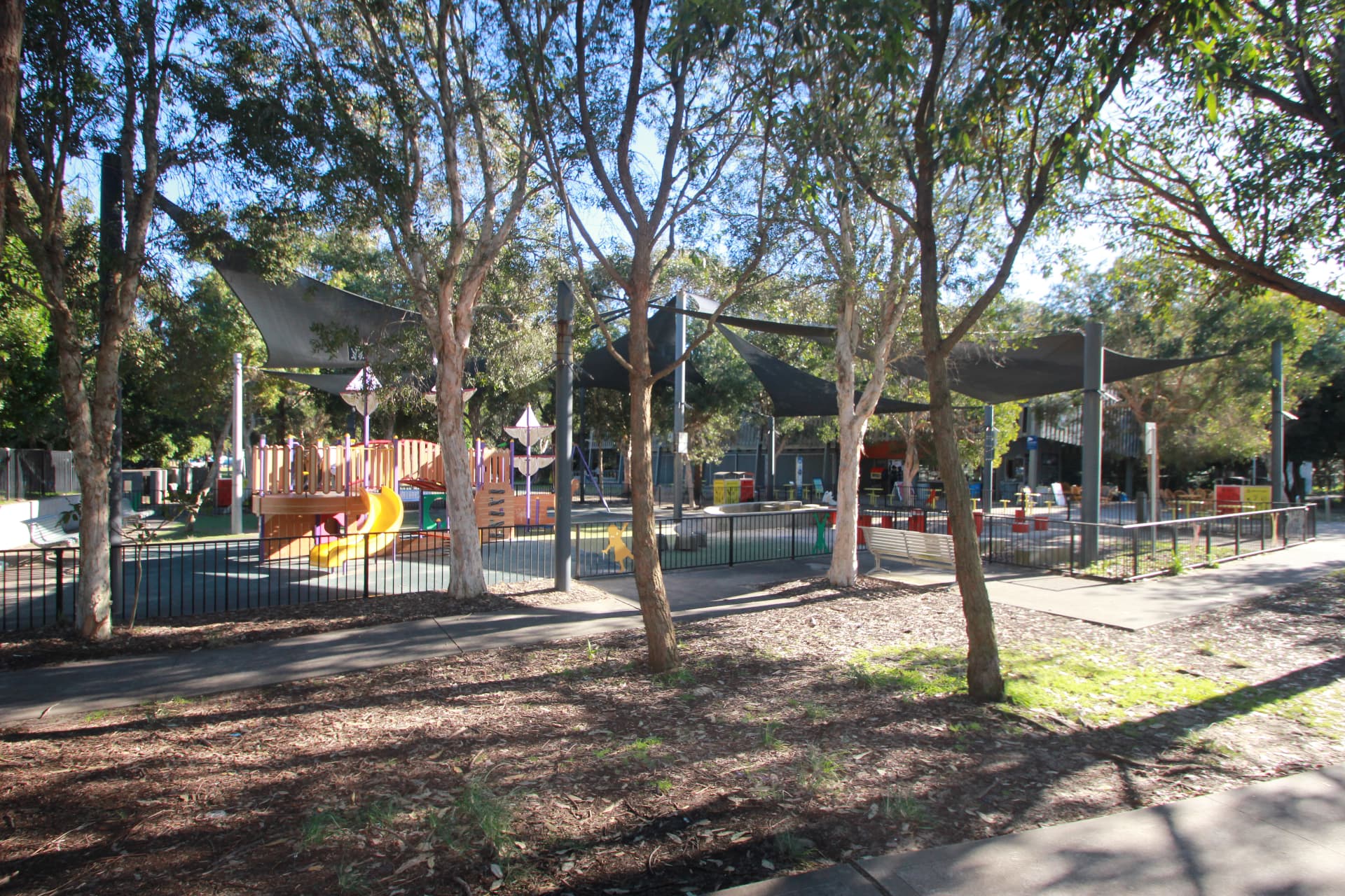 The shaded enclosed playground and skate park beside Umina Beach
